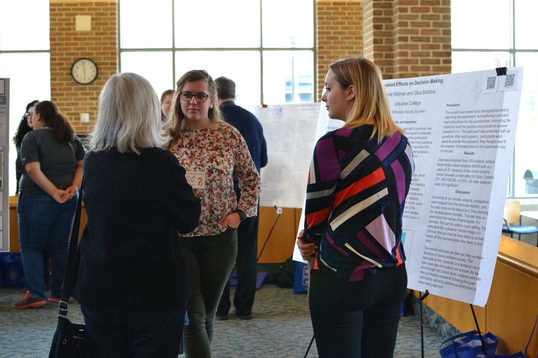 Students discuss work at Student Research Symposium