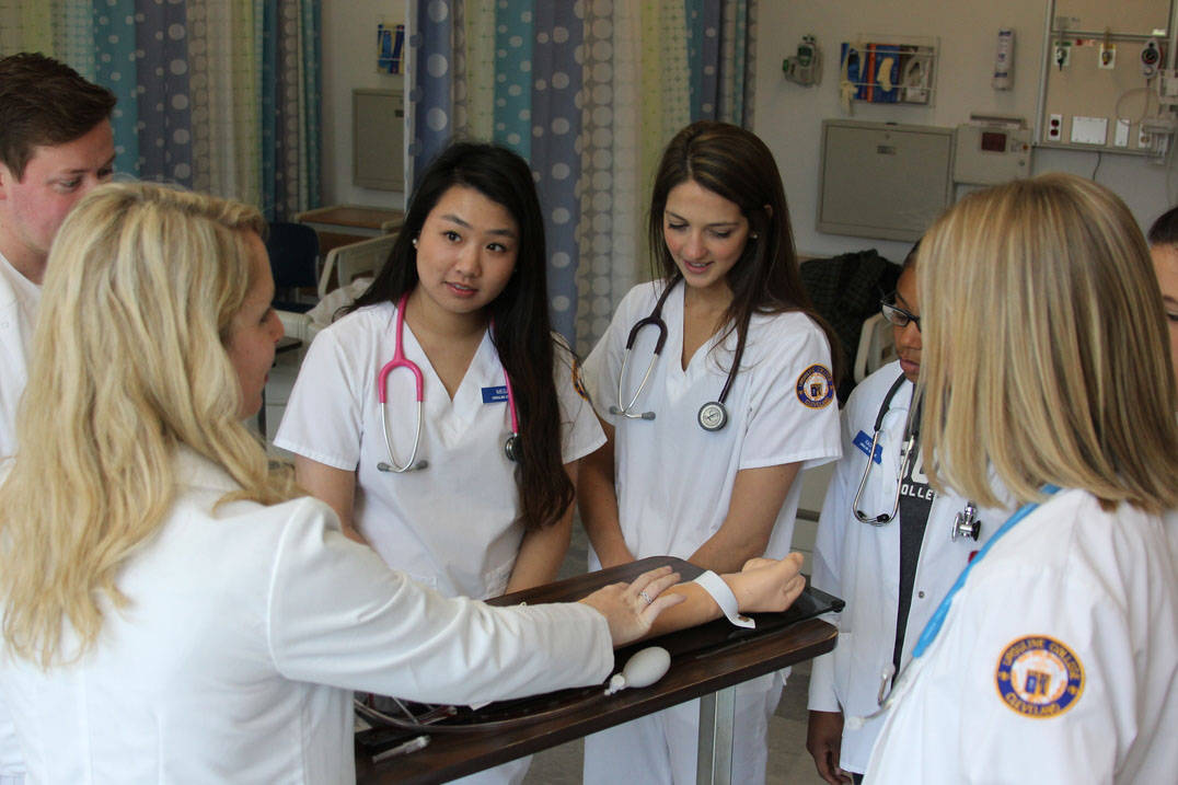 BSN degree students learn how to draw blood