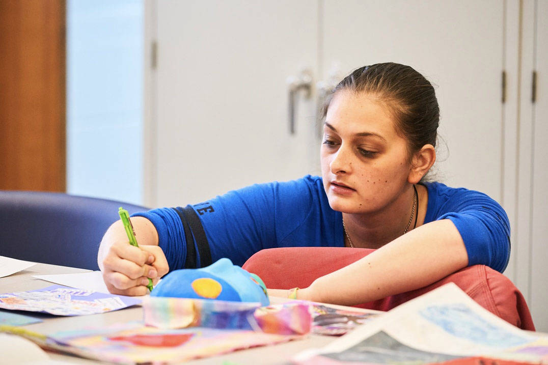 A student works on an art project at Ursuline College