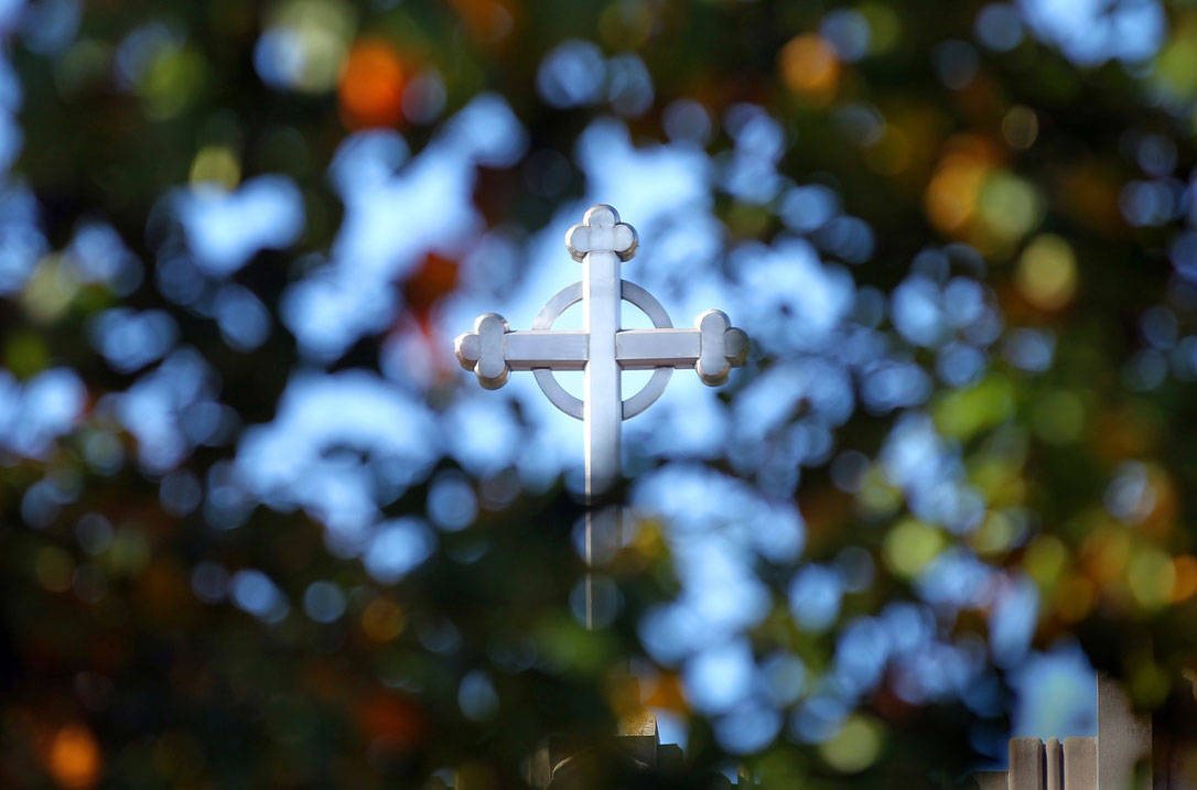 Cross in leaves at Cleveland, Ohio master's in theology program campus